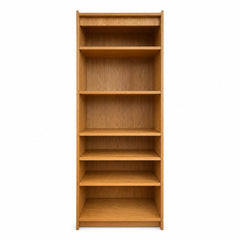 Honey oak mid-century bookcase with tall vertical shelving and clean lines