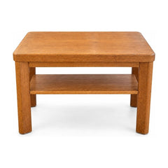 Honey oak end table in solid wood with a warm light grain and a simple rectangular top.