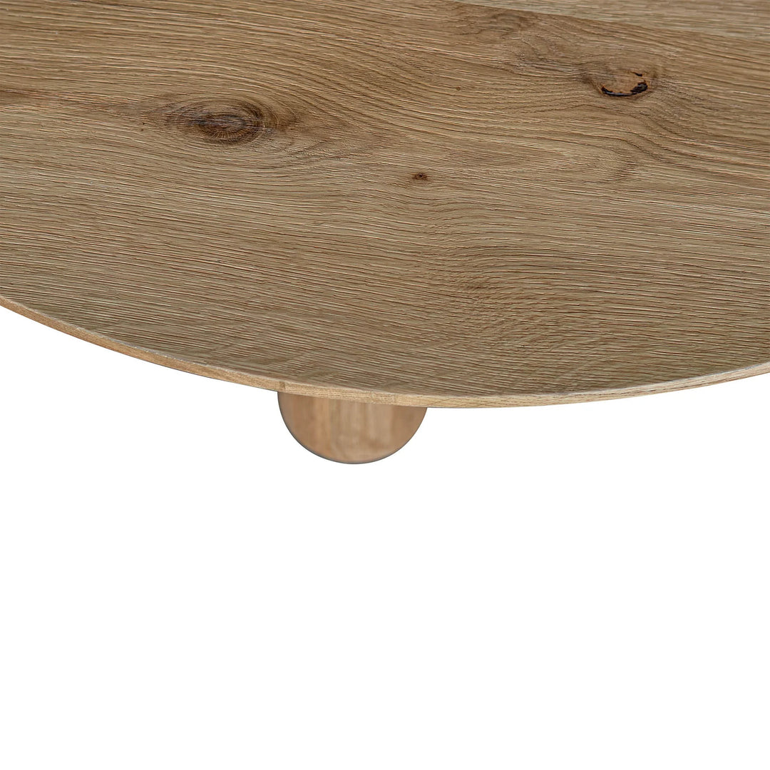 Jasper Round Dining Table detail view of natural oak wood finish and block leg construction - Whats New Furniture Portland OR