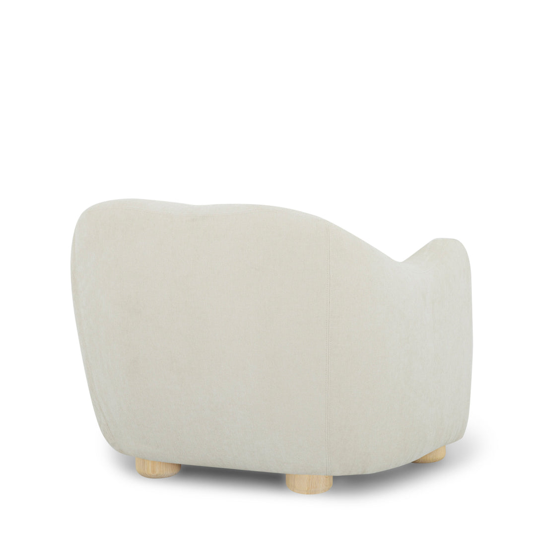 Joss Armchair in Bone lifestyle setting - mid-century cocooning armchair private label - Whats New Furniture Portland OR