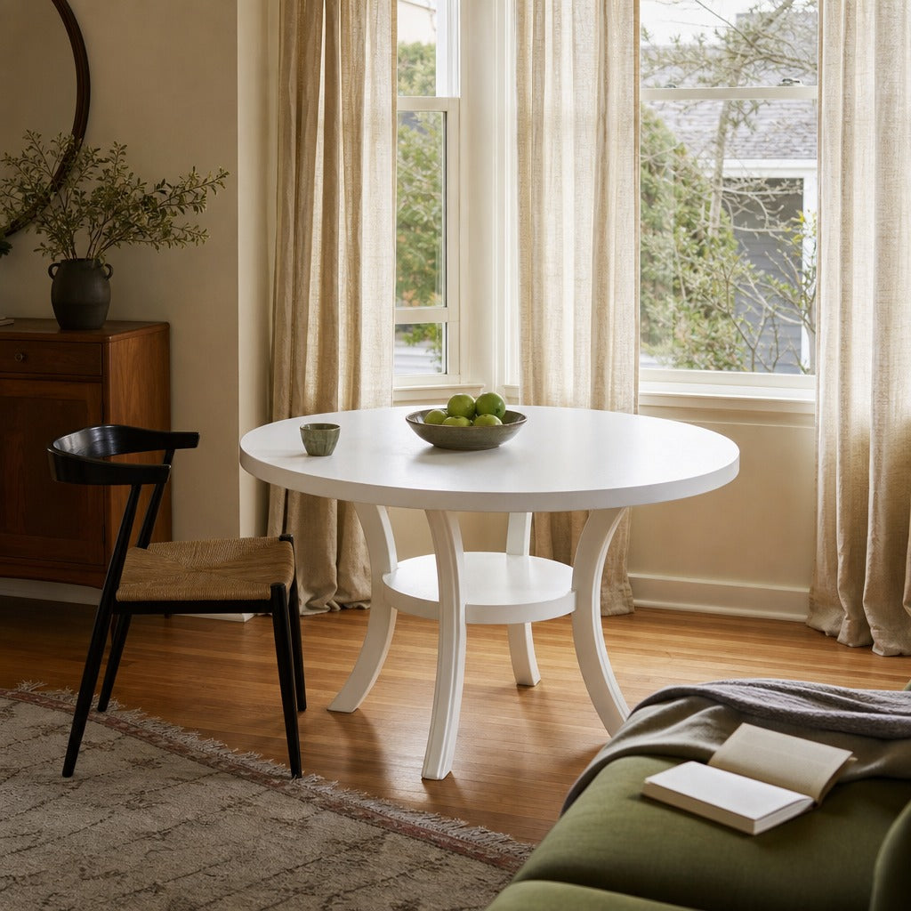Judd 54 Inch Round Dining Wood Table With Shelf Pearl White styled in Portland Sellwood cottage living room - What&