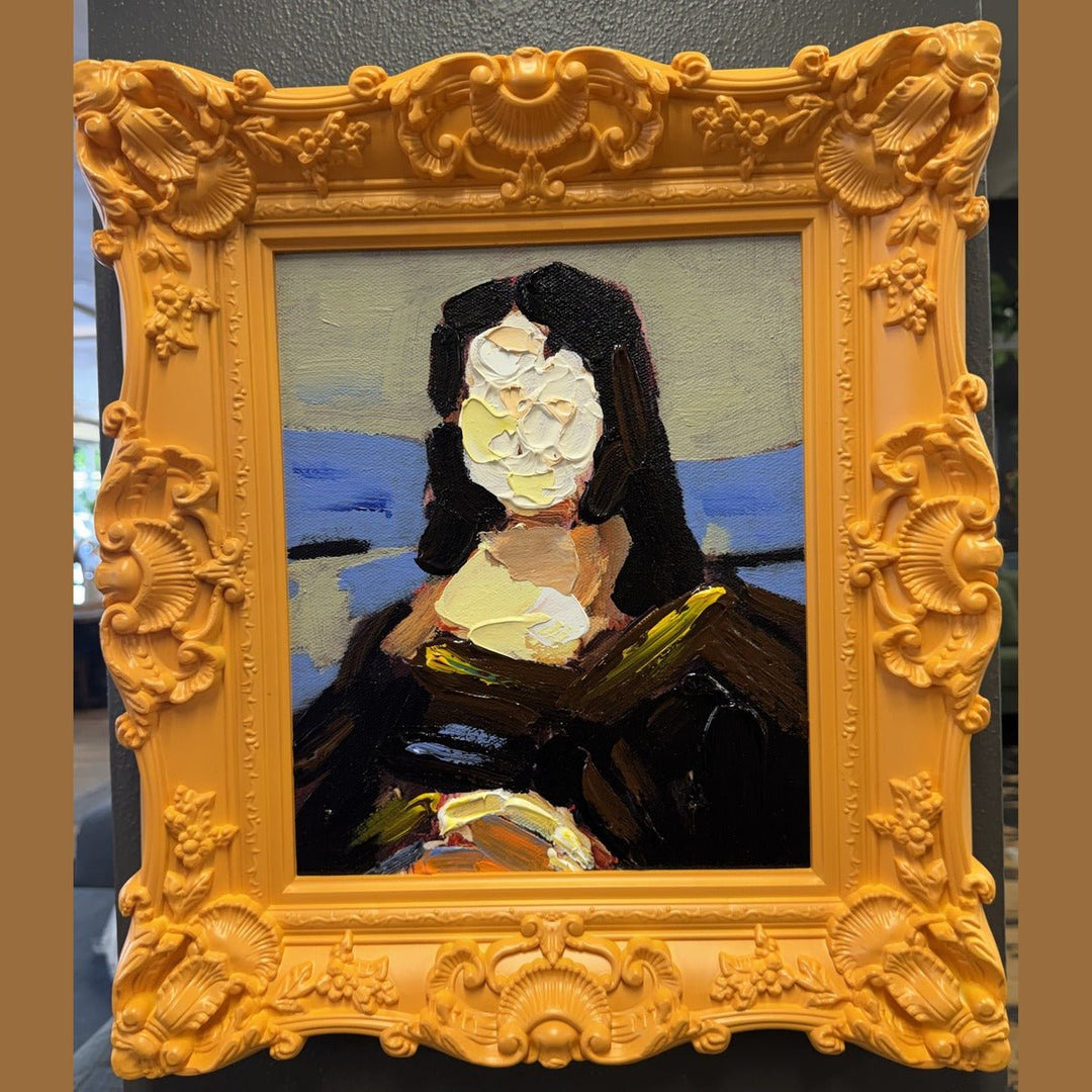 Framed acrylic portrait painting in a carved orange baroque frame, photographed in the What's New Furniture showroom