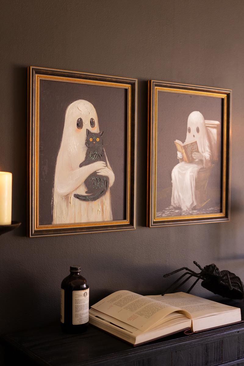 Framed Halloween ghost paintings side by side on a dark wall above an apothecary bottle - ghost wall art by Kalalou - Whats New Furniture Portland OR
