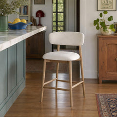 Milo Counter Stool in Savile Flax, upholstered counter stool at a kitchen island in a Portland home - Whats New Furniture