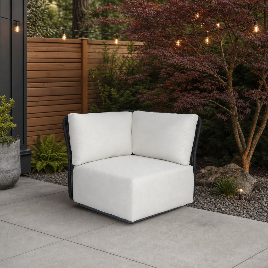 Naples Outdoor Sectional Corner on a backyard patio conversation corner with a gravel border - What&