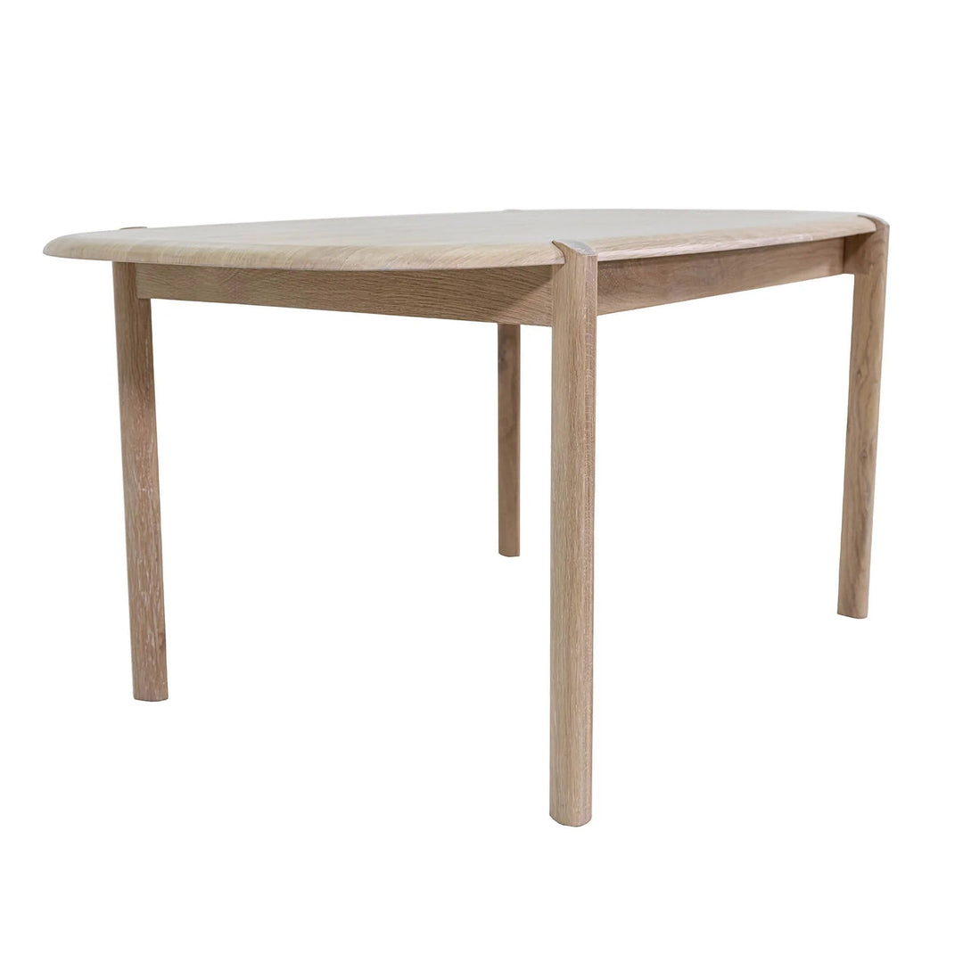 Runway Dining Table in Light Oak, low three-quarter angle - Whats New Furniture
