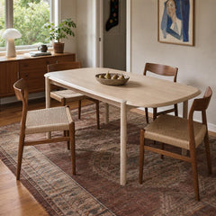 Runway Dining Table in Light Oak with dining chairs in a Portland dining room - Whats New Furniture