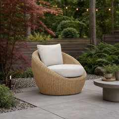 Siesta Outdoor Round Club Chair on a backyard patio conversation corner with a gravel border - What&