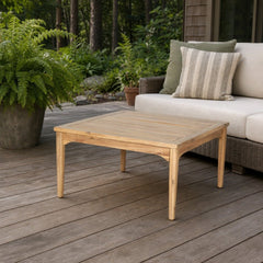 Sonoma Outdoor Square Coffee Table on a cedar deck beside an outdoor lounge setting - What&
