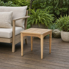 Sonoma Outdoor Square Side Table on a cedar deck beside an outdoor lounge setting - What&