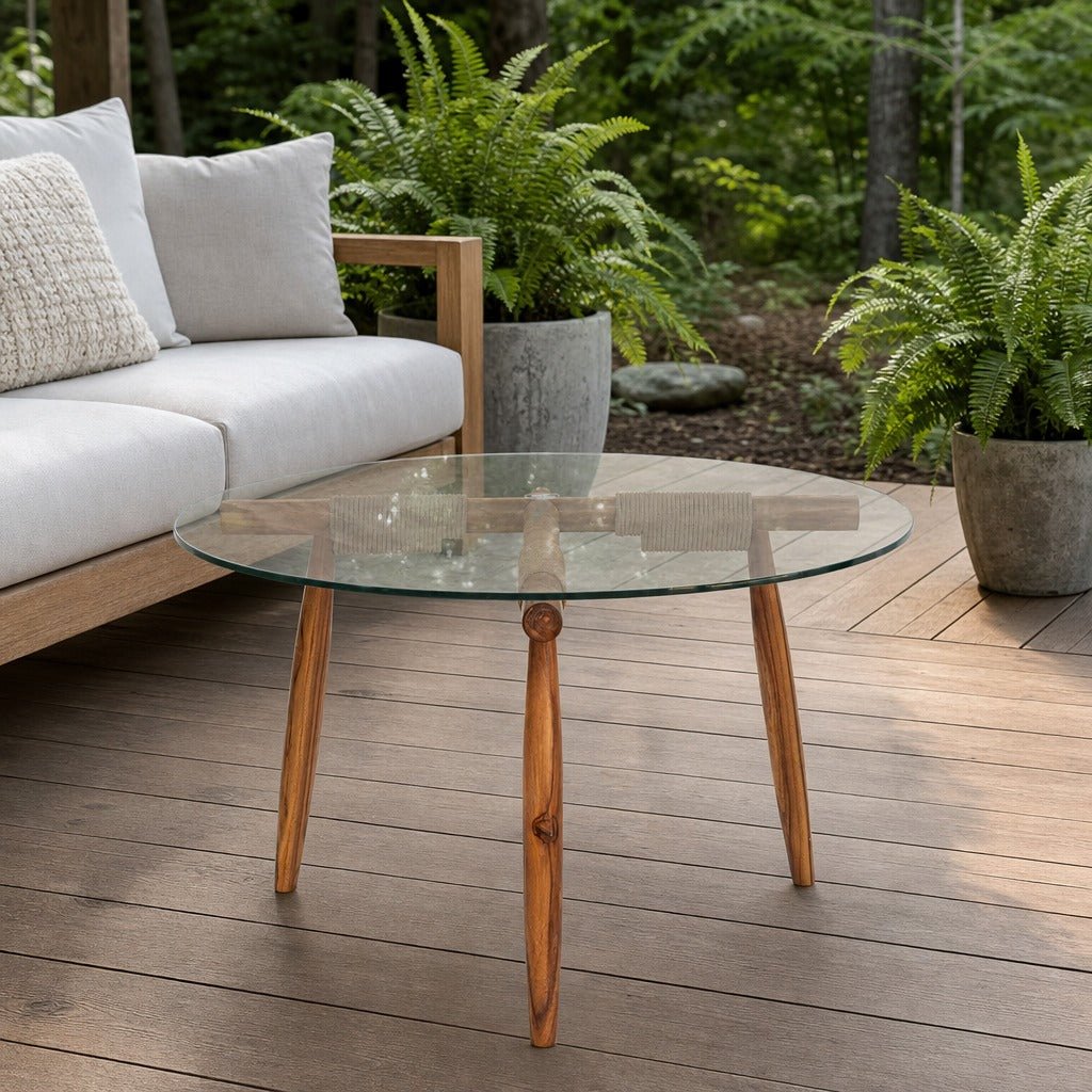 Vineyard Outdoor Round Coffee Table on a cedar deck beside an outdoor lounge setting - What&