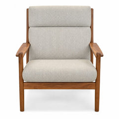 Light green mid-century armchair with solid wood frame and Japanese joinery