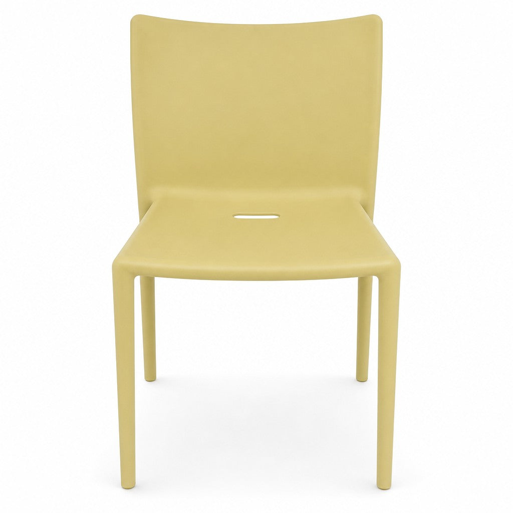 Lime green molded Air Chair with continuous single-piece design by Jasper Morrison