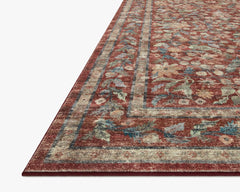 Angled view of the Courtyard Eve Crimson rug showing the CloudPile surface and ornate border - Loloi Rugs - Whats New Furniture Portland