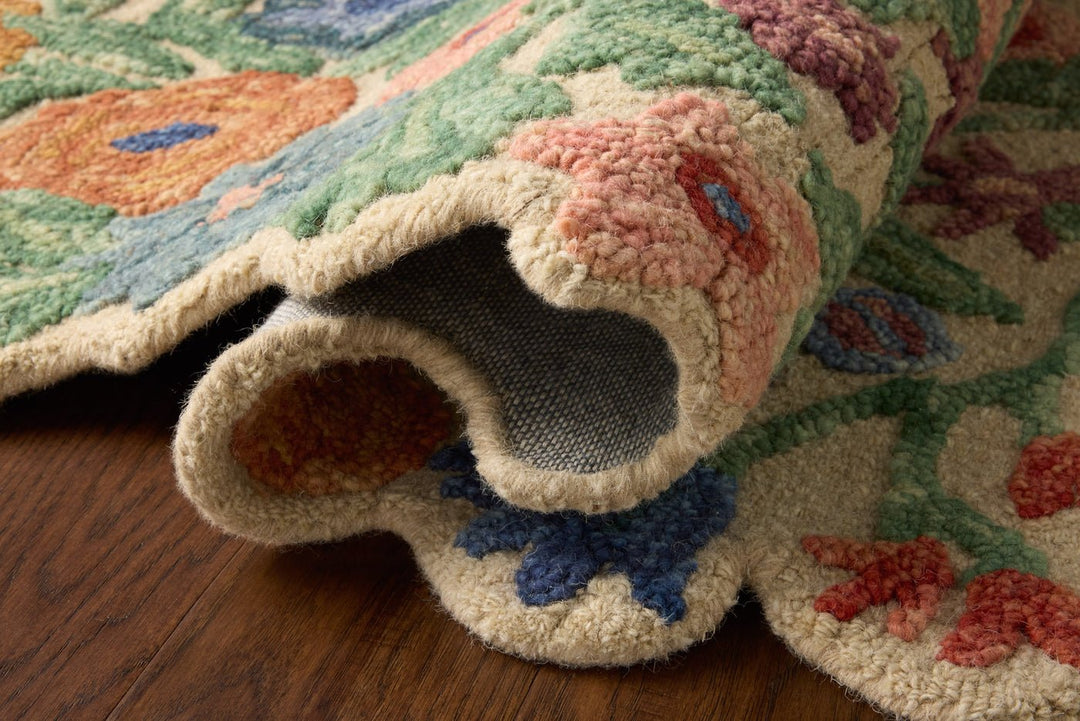 Rolled Edith Ivory Multi rug showing the scalloped live edge and pile depth - Loloi Rugs - Whats New Furniture Portland