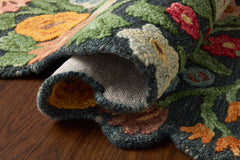 Rolled Edith Navy Multi rug showing the live edge silhouette and pile depth - Loloi Rugs - Whats New Furniture Portland