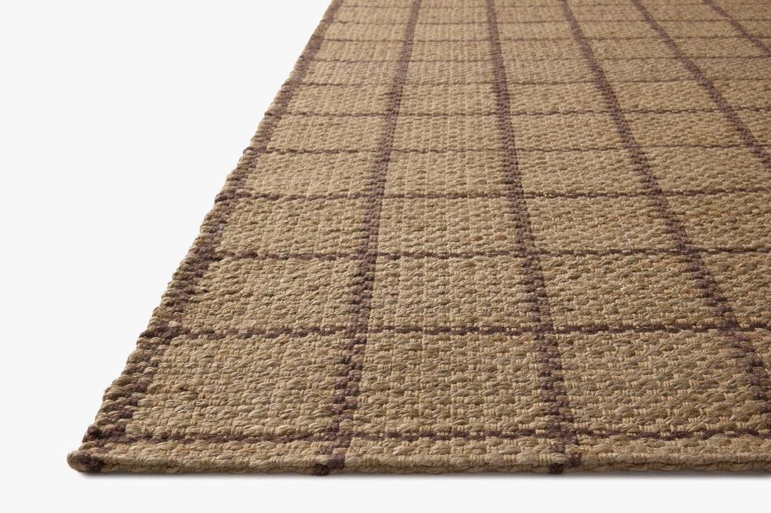 Angled view of the Fletcher rug showing the chunky jute texture and checkerboard-stitched grid lines - Loloi Rugs - Whats New Furniture Portland