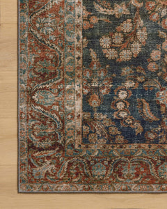 Border detail of the Jules Ocean Spice rug showing the rust medallion frame - Whats New Furniture Portland OR