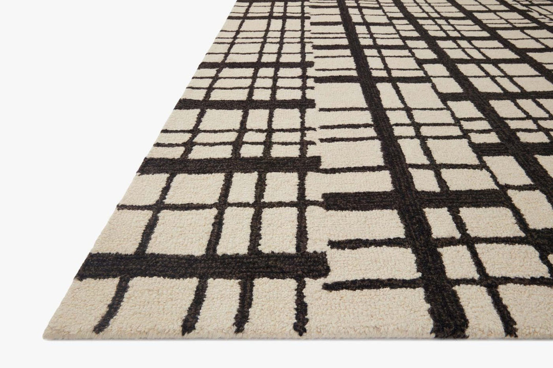 Angled view of the Polly Black Ivory rug showing the hand-tufted wool pile - Loloi Rugs - Whats New Furniture Portland