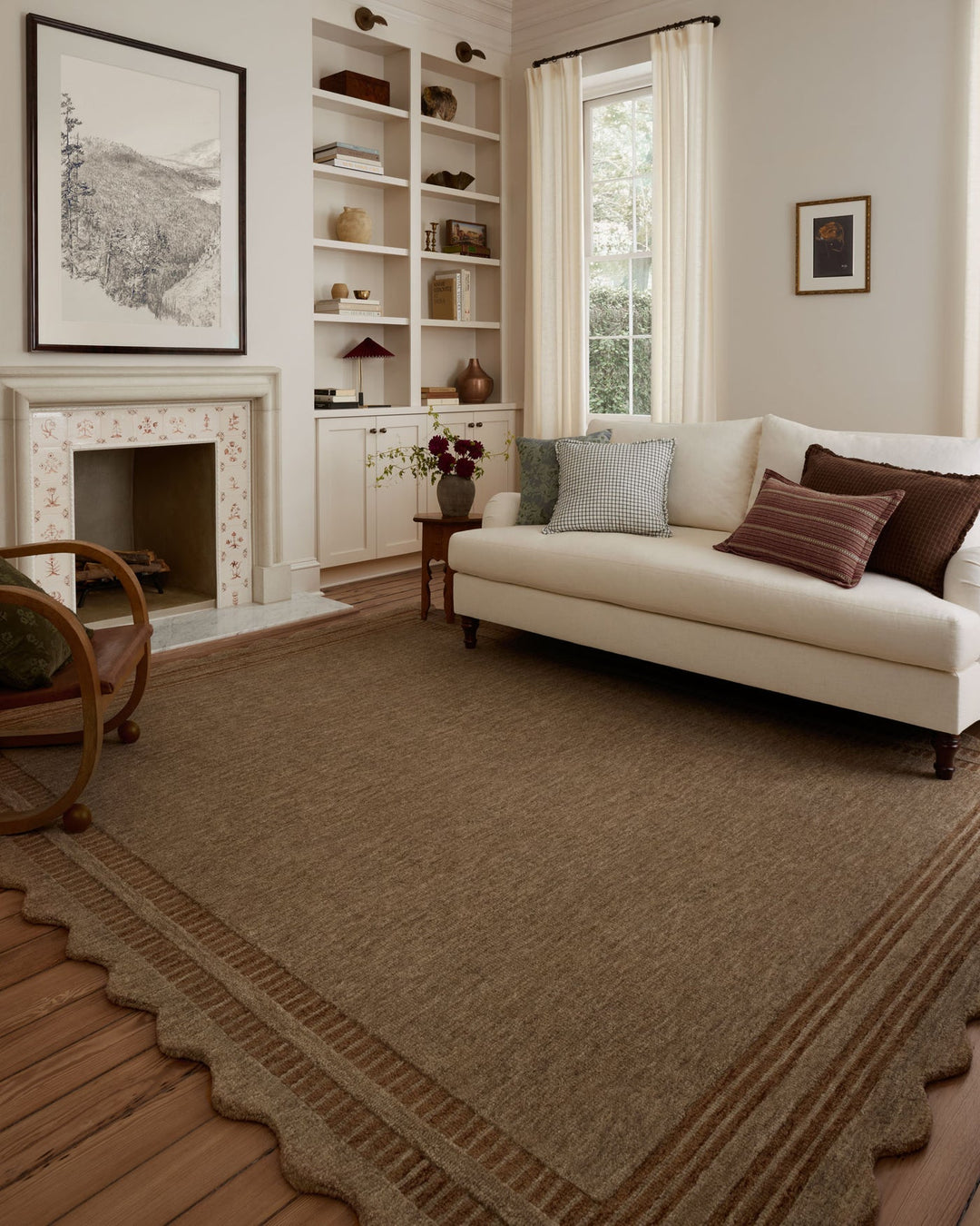 Scottie Mocha/Clay wool rug styled in a living room with white built-ins and a cream sofa in a Portland home - Whats New Furniture