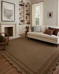 Scottie Mocha/Clay wool rug styled in a living room with white built-ins and a cream sofa in a Portland home - Whats New Furniture