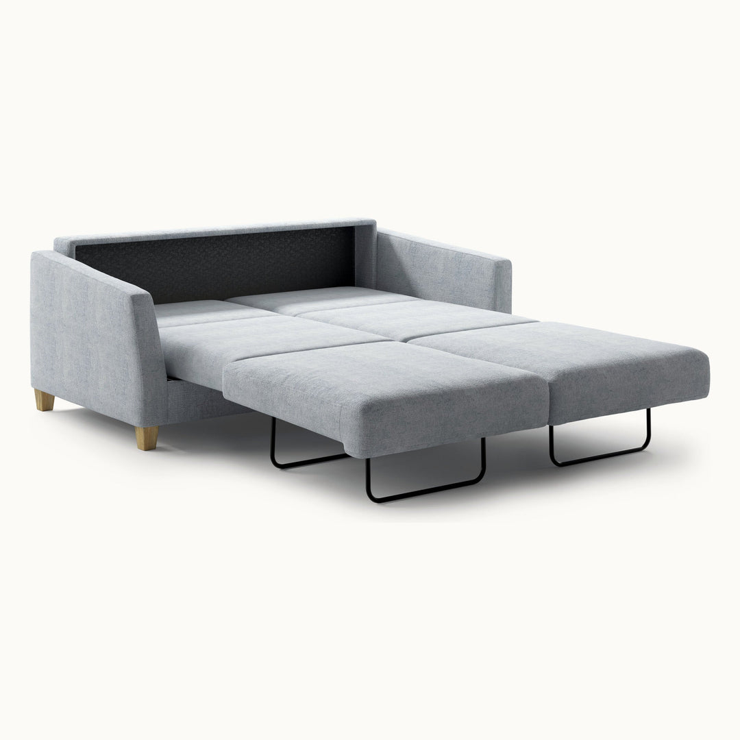 Monika Queen Loveseat Sleeper in Cerona 70, Oak legs — bed extended, angle view - What&