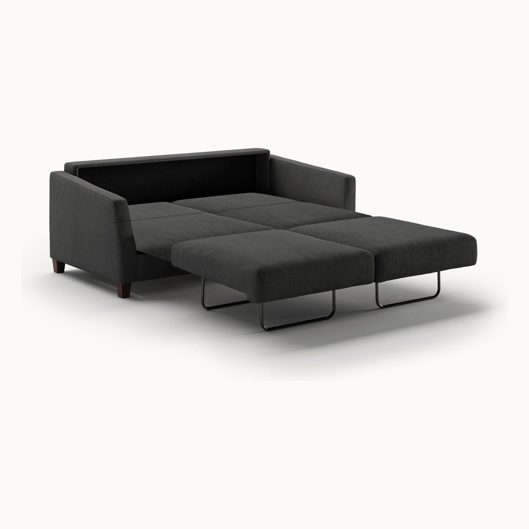 Monika Queen Loveseat Sleeper in Loule 630, Walnut legs — bed extended, angle view - What&