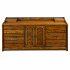 Medium oak mid-century nine-drawer dresser with clean horizontal lines