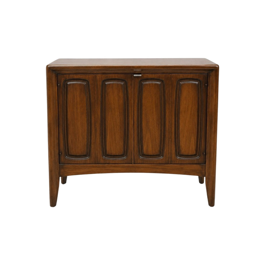 Medium walnut mid-century sideboard with a compact low case by Broyhill