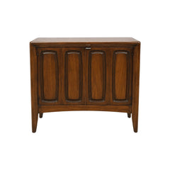 Medium walnut mid-century sideboard with a compact low case by Broyhill
