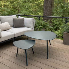 Naples Outdoor Nesting Coffee Table Set on a cedar deck beside an outdoor lounge setting - What&