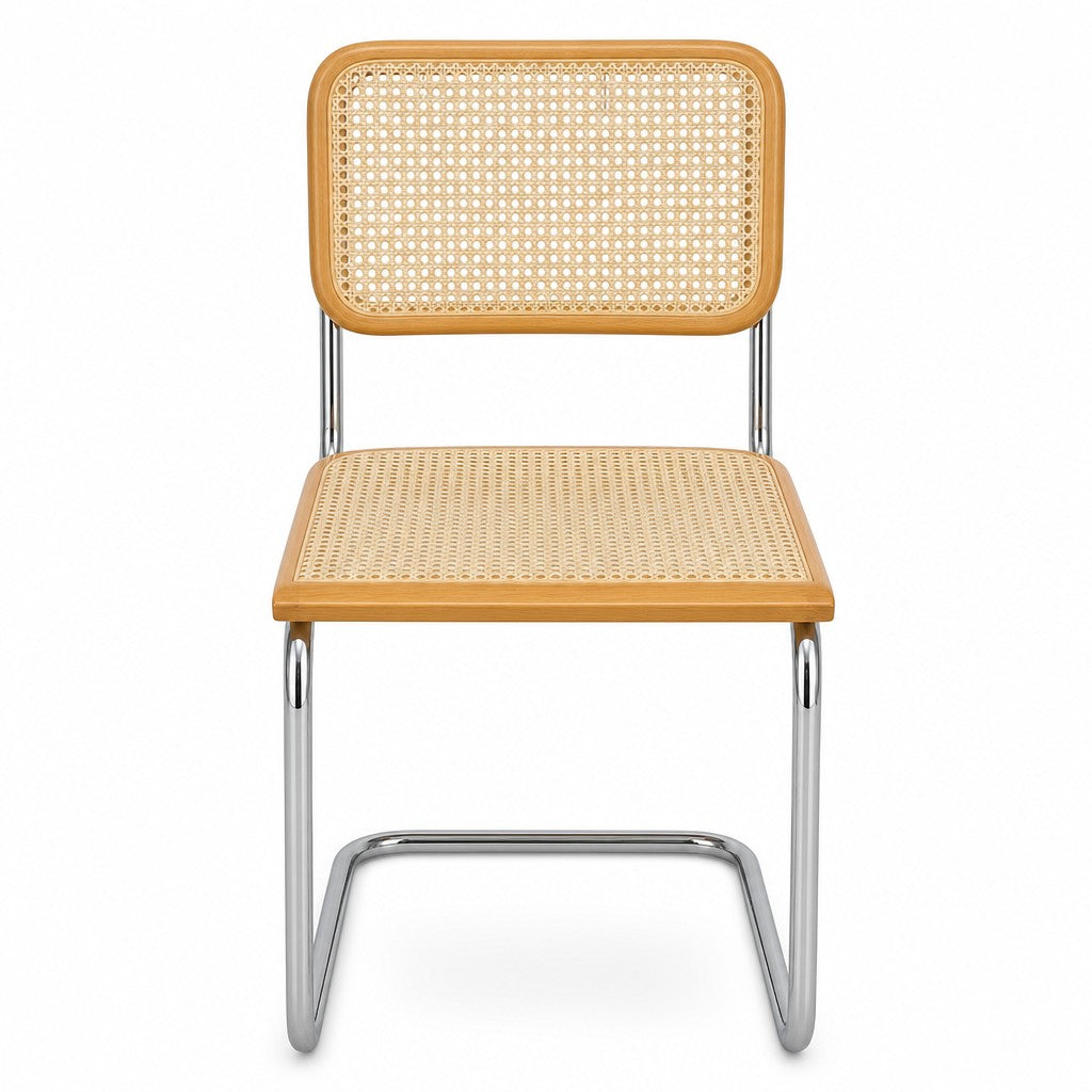 Natural cane and chrome dining chair with a woven cane back and slim polished frame