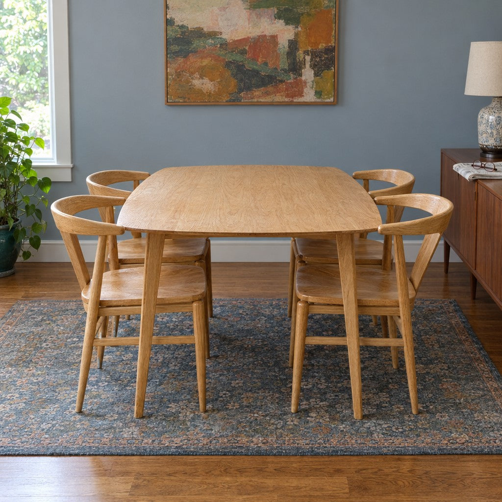 Natural Oak dining table and four chairs with a rectangular wood top. - detail view 1