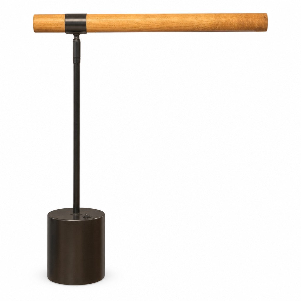 Natural wood and black table lamp by West Elm with a sculptural wood base