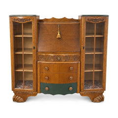 Natural wood secretary desk with tall slim proportions and drop-front silhouette.