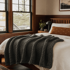 Chunky Double Knit Throw in Charcoal styled in Portland bedroom - Whats New Furniture