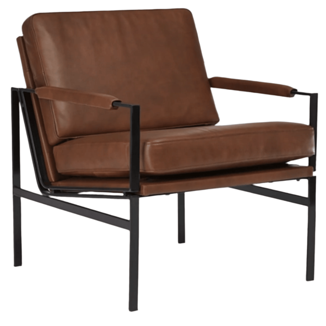 Puckman Accent Chair in brown lifestyle setting - industrial leather accent chair by Ashley - Whats New Furniture Portland OR