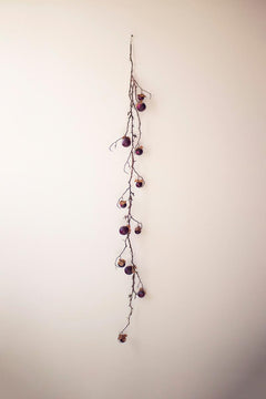 Purple Botanica Garland on a studio background - faux plants by Kalalou - Whats New Furniture Portland OR