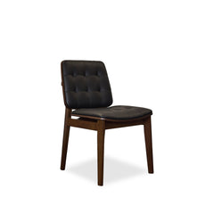 Redbridge Dining Chair in Black lifestyle setting - tufted dining chair by Coaster - Whats New Furniture Portland OR