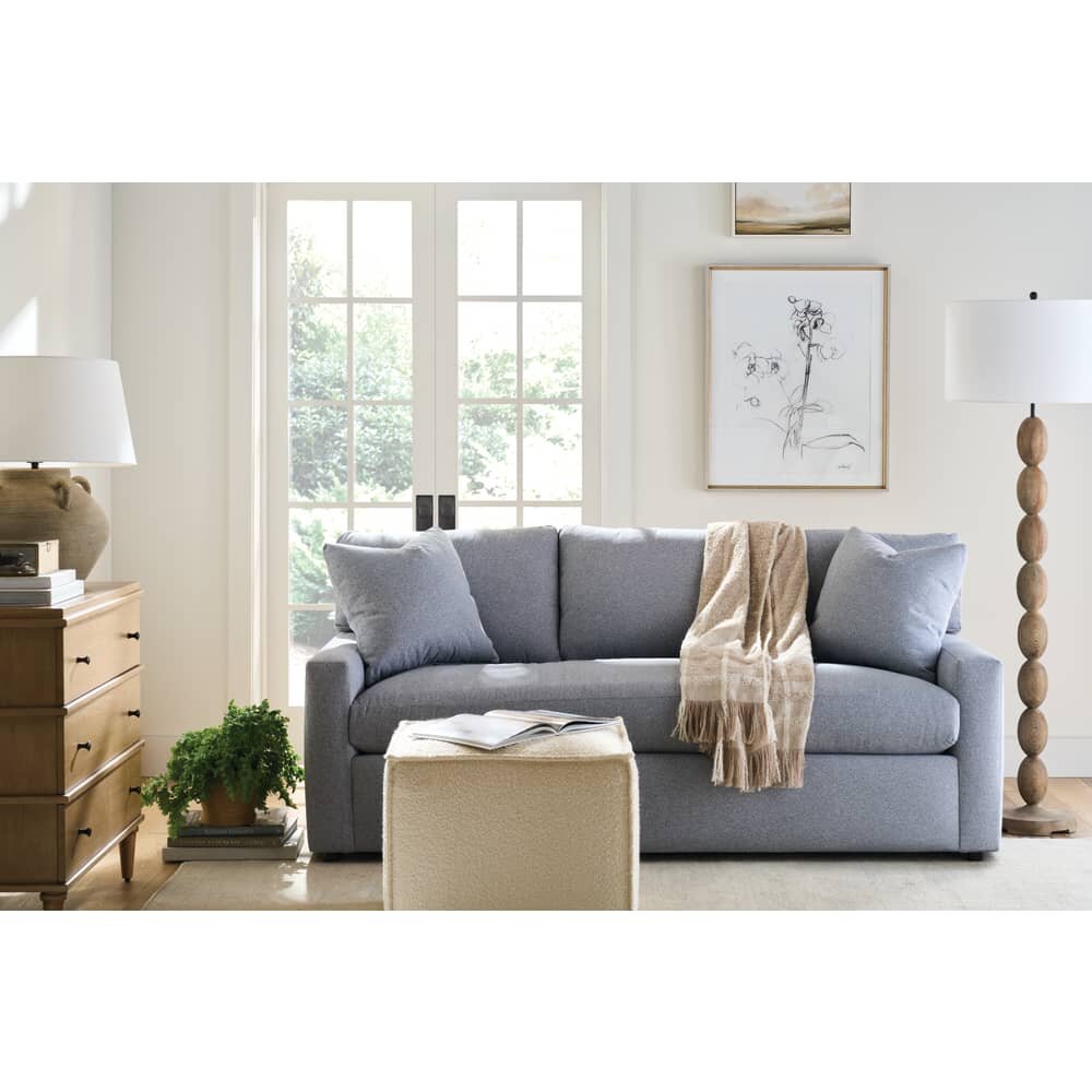 Rowe Concord track-arm sofa in blue fabric with two throw pillows, bench-cushion version, in a styled living room - Whats New Furniture Portland