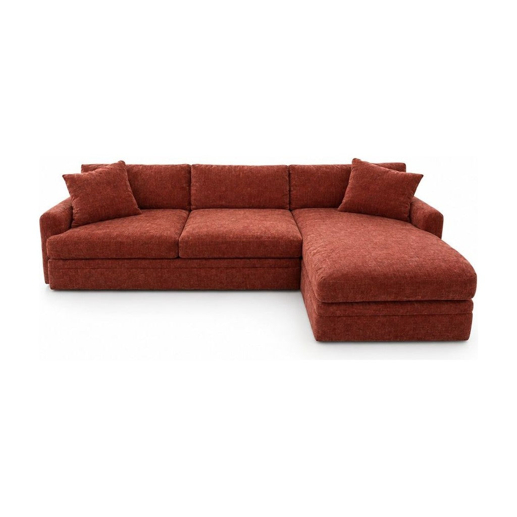 Rust chaise sectional with an extended chaise lounge end.