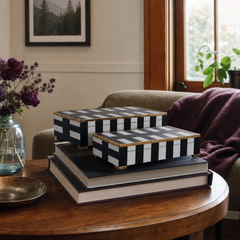 Black and white striped boxes styled on a Portland coffee table - Whats New Furniture