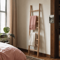 Teak blanket ladder with throws styled in a Portland bedroom - Whats New Furniture