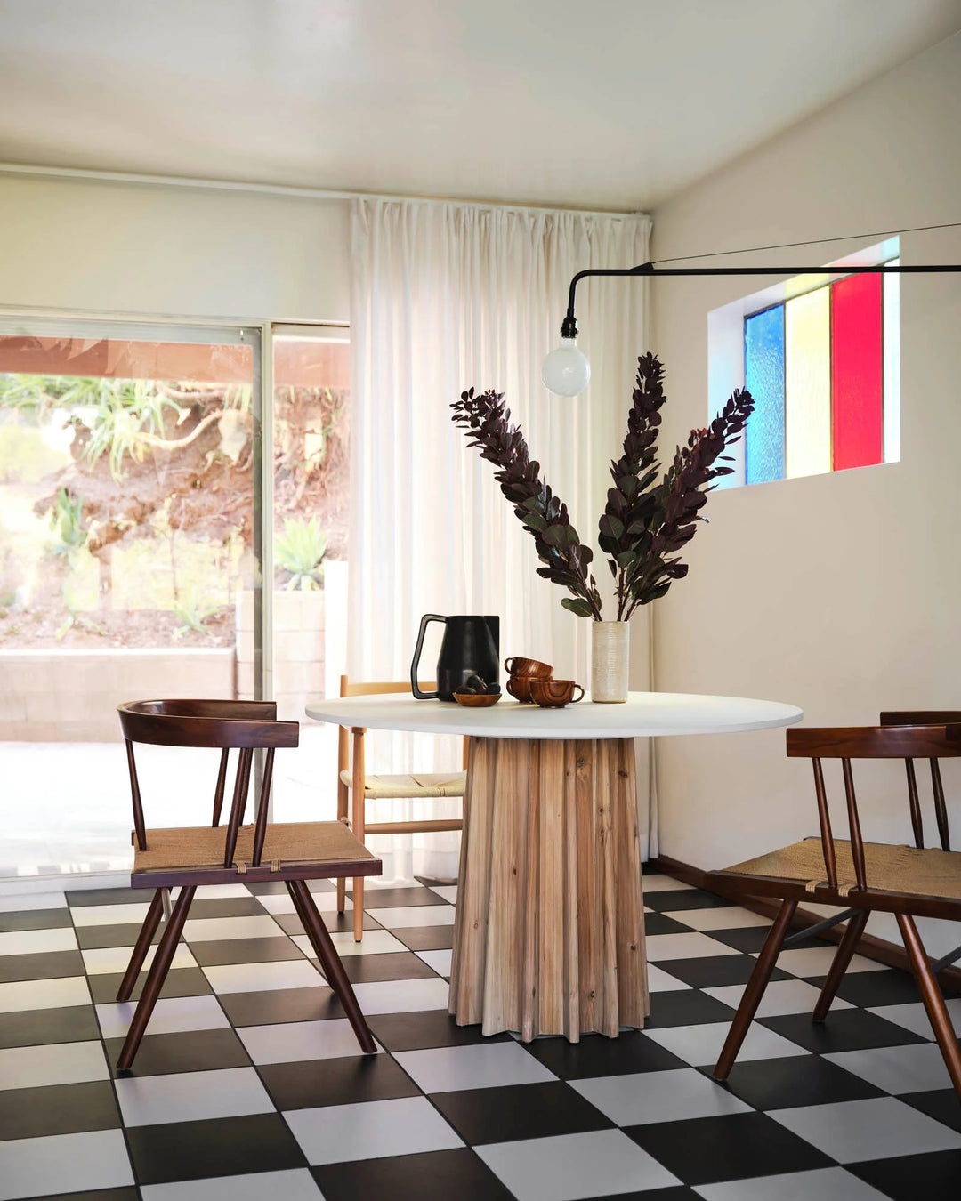 Sculpture Dining Table in White Concrete Wash showroom angle - round oak and concrete dining table by LH Imports - Whats New Furniture Portland OR