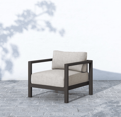 Sonoma Outdoor Chair, Bronze in Venao Grey lifestyle setting - aluminum outdoor lounge chair by Four Hands - Whats New Furniture Portland OR