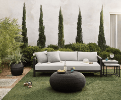 Sonoma Outdoor Sofa, Bronze in Venao Grey lifestyle setting - teak outdoor sofa by Four Hands - Whats New Furniture Portland OR