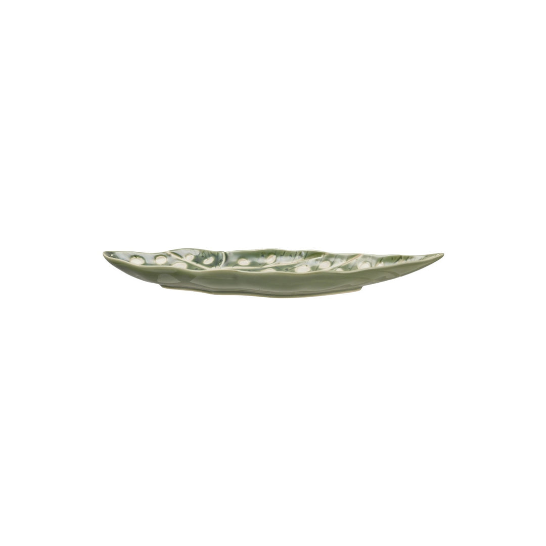 Stoneware Leaf Shaped Plate in green, side profile showing the shallow well and flat foot - serveware by Creative Co-Op - Whats New Furniture Portland OR