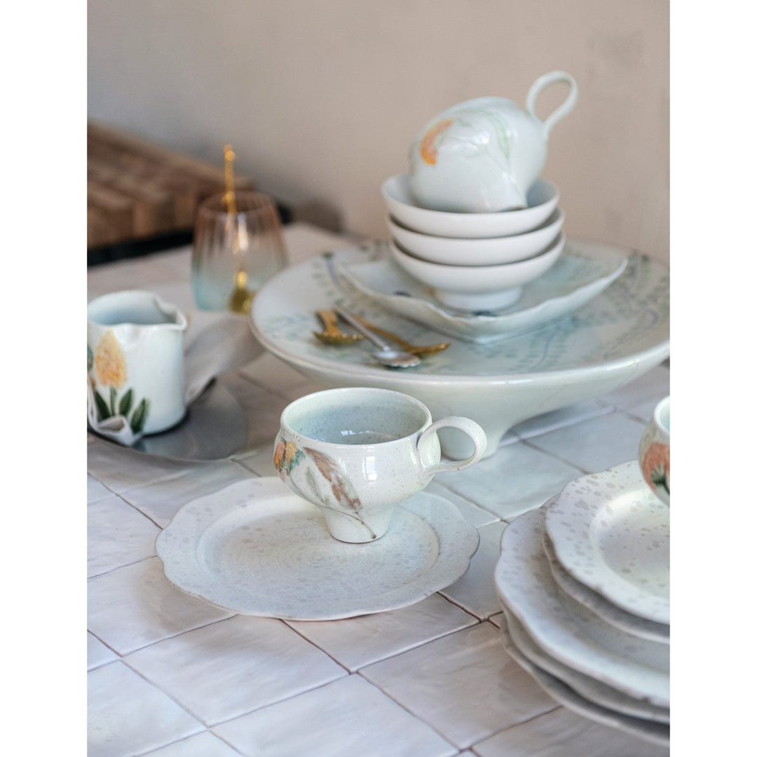 8" Stoneware Scalloped Plate White Speckled - styled on a set table with stacked plates - Creative Co-Op - What&