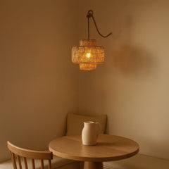 Wicker pendant lamp glowing over a Portland dining nook - Whats New Furniture