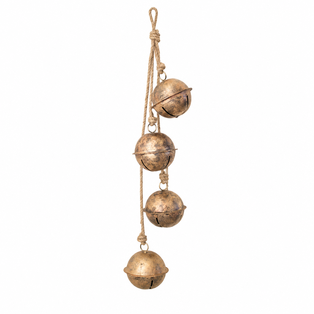 String of Brass Finish Bells on a studio background - home decor by Kalalou - Whats New Furniture Portland OR